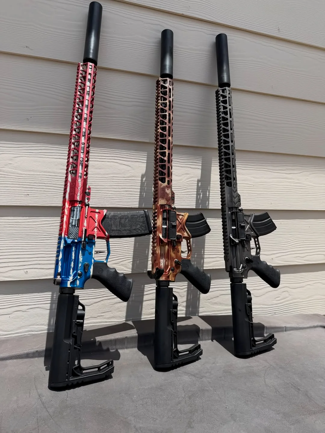 Lineup of three Texas Coastal Armory rifle builds