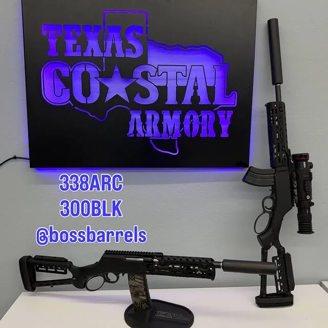 Custom rifle displayed with Texas Coastal Armory branding